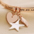 Close Up of Charms on Rose Gold Personalised 'Never Forgotten' Meaningful Word Bangle