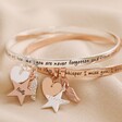 Personalised 'Never Forgotten' Meaningful Word Bangle in Rose Gold and Silver on Neutral Fabric