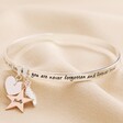 Silver Personalised 'Never Forgotten' Meaningful Word Bangle on Neutral Fabric
