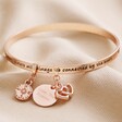 Rose Gold Personalised 'Sisters' Meaningful Word Bangle on Neutral Fabric