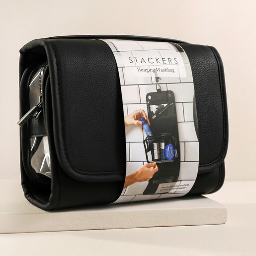 Stackers Black Hanging Travel Washbag Folded Up on Neutral Background
