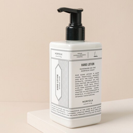 Norfolk Natural Living Coastal Hand Lotion on Neutral Background