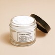 Norfolk Natural Living Flower Booster with lid off revealing white powder