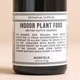Close up of label on the Norfolk Natural Living Indoor Plant Food bottle
