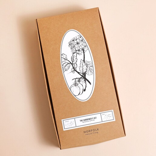 Floral label on top of Norfolk Natural Living The Gardener's Set box