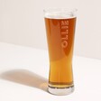 Personalised Bold Name Pilsner Pint Glass with ollie personalisation in front of white background