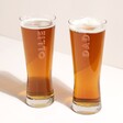 Personalised Bold Name Pilsner Pint Glasses with dad and ollie personalisation on white background