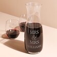 Personalised Couples Crystal Carafe with Mrs & Mrs Williams personalisation on neutral coloured background