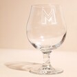 Empty Personalised Initial Stemmed Beer Glass with Beige Background