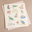 Cath Kidston Top Dog Birthday Card with Striped Envelope on Flat Surface