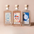 All 3 Flavours of 20cl Tarot Card Alcohol on Neutral Background