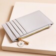 Personalised Engraved Card Holder in Grey on Neutral Coloured Background