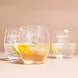 Personalised Name Gin Tumblers with different personalisations full of liquid