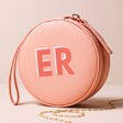 Peach Pink Personalised Block Initials Mini Round Travel Jewellery Case on Neutral Background