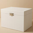 White Musical Jewellery Box Closed with Beige Background
