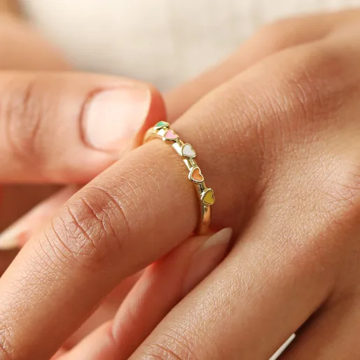 Close Up of Model Wearing Adjustable Enamel Heart Ring in Gold