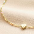 Close up of charm on Heart Charm Rainbow Enamel Ball Chain Anklet 