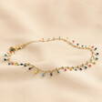 Multicoloured Enamel Droplet Chain Anklet in Gold on Neutral Fabric 