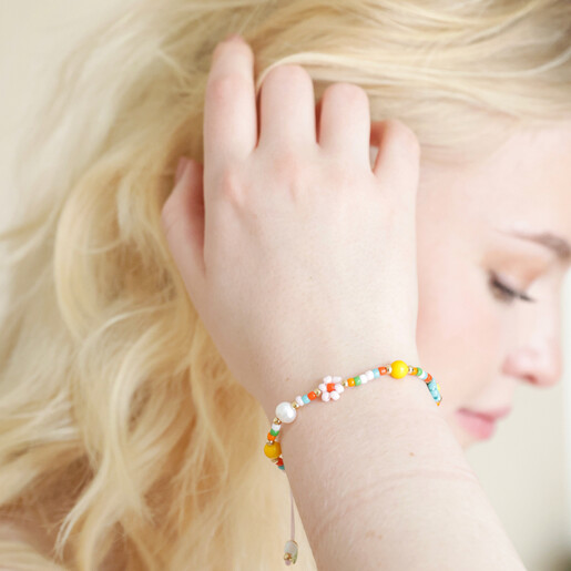 Model Wearing Bracelet Model wearing Colourful Flower and Pearl Beaded Bracelet on wrist