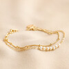 Freshwater Pearl Double Satellite Chain Bracelet in Gold on Beige Fabric