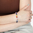 Model Wearing Pride Semi-Precious Beaded Bracelet in Rainbow with Hand on Arm