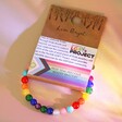 Pride Semi-Precious Beaded Bracelet in Rainbow in Packaging on Neutral Coloured Background