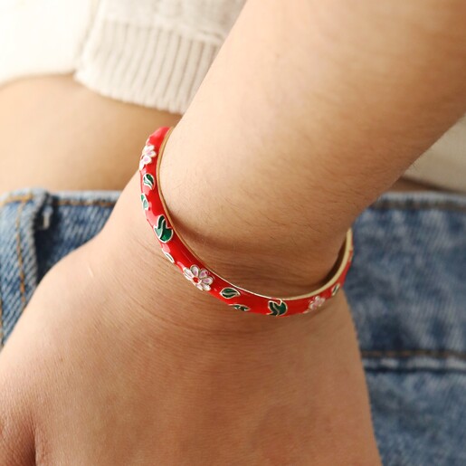 Close Up of Red Cloisonné Bangle in Gold on Model