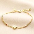 Smiling Heart Face and Enamel Ball Chain Bracelet in Gold on neutral coloured material