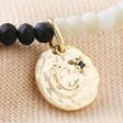 Close Up of Charm on Talisman Moon Charm Navy and Grey Beaded Bracelet in Gold