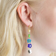Asymmetrical Millefiori Flower Bead Drop Earrings on Model