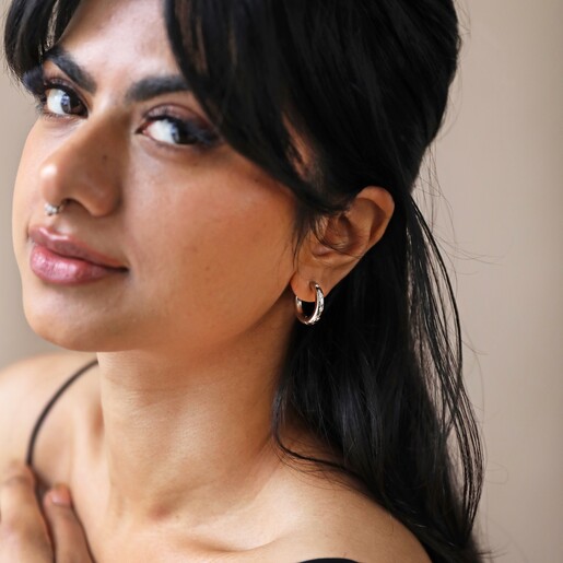 Chunky Crystal Hoop Earrings in Silver Worn by Model