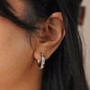Model Wearing Chunky Crystal Hoop Earrings in Silver