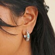 Close Up of Cloisonné Hoop Earrings in Silver on Model