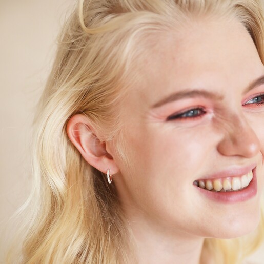 Crystal Huggie Hoops in Silver on Model