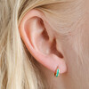 Close Up of Model Wearing Green Enamel Scalloped Huggie Hoop Earrings in Gold