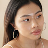 Large Tortoiseshell Resin Hoop Earrings in Rainbow on Model