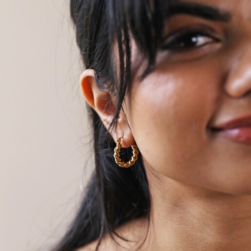 Medium Twisted Rope Hoop Earrings in Gold Worn by Model