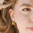 Small Amber Resin Hoop Earrings in Gold on Model