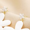 Close Up of Stud Fastening on White Enamel and Pearl Daisy Drop Earrings in Gold