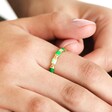 Close up of Adjustable Green Enamel Twist Ring in Goldon Models Hand