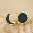Navy Enamel Mismatched Sun and Moon Stud Earrings in Gold on Beige Fabric