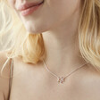 Close Up of Model Wearing Mixed Metal Crystal Double Star Pendant Necklace in Silver
