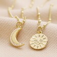 Mother & Child Set of 2 Sun and Moon Necklaces in Gold on Beige Fabric