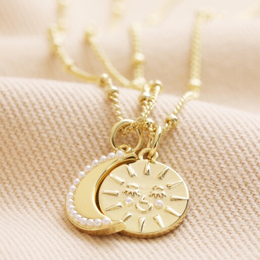 Sun and moon interlocking shop necklace