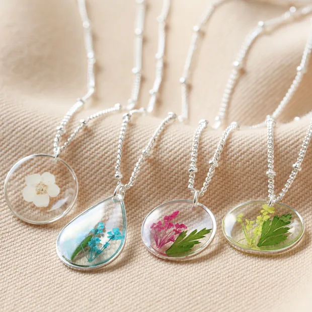 Model Wearing December Pressed Birth Flower Pendant Necklace in Silver Model Wearing December Pressed Birth Flower Pendant Necklace in Silver