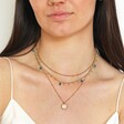Semi-Precious Jade Stone Droplet Necklace in Gold with other necklaces on model