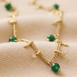 Semi-Precious Stone Green Beaded Droplet Necklace in Gold on Neutral Fabric