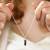 Model Holding Sodalite Crystal Point Pendant Necklace in Silver