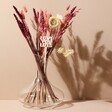 Love You Lots Valentine's Small Dried Flower Bouquet in Glass Vase on Pink Background