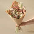 Luxury Vintage Pink Dried Flower Bouquet in Packaging Held by Model